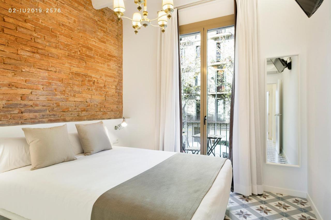 Uma Suites Sagrada Familia Barcelona Bagian luar foto